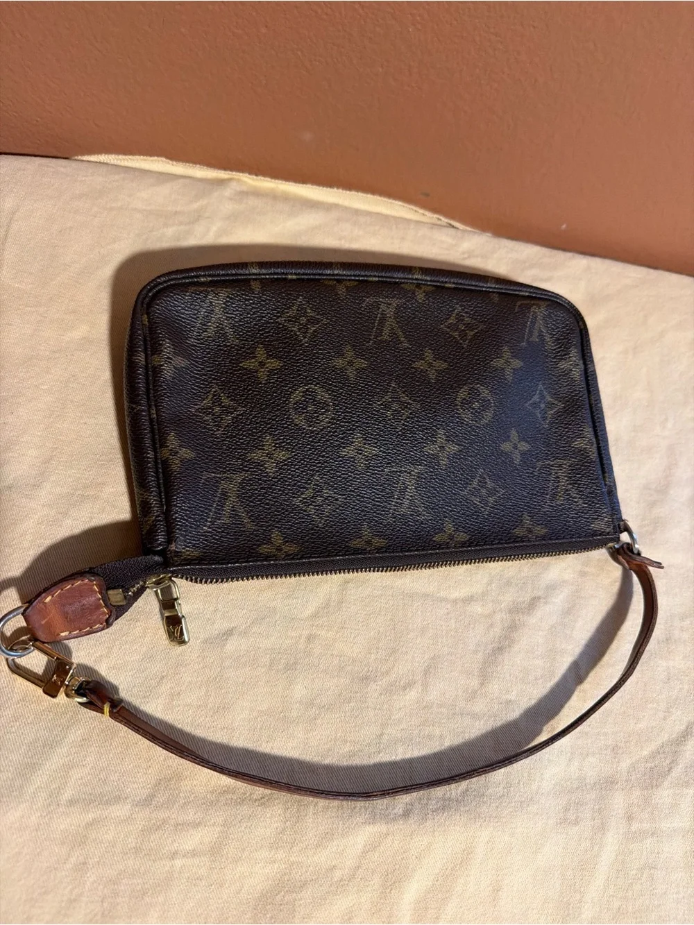 Louis Vuitton Monogram Canvas Mini Pochette in Brown and Gold